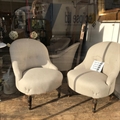 Pair of French slipper chairs covered in Taupe linen with a buttoned back, beechwood turned legs. Pre War.